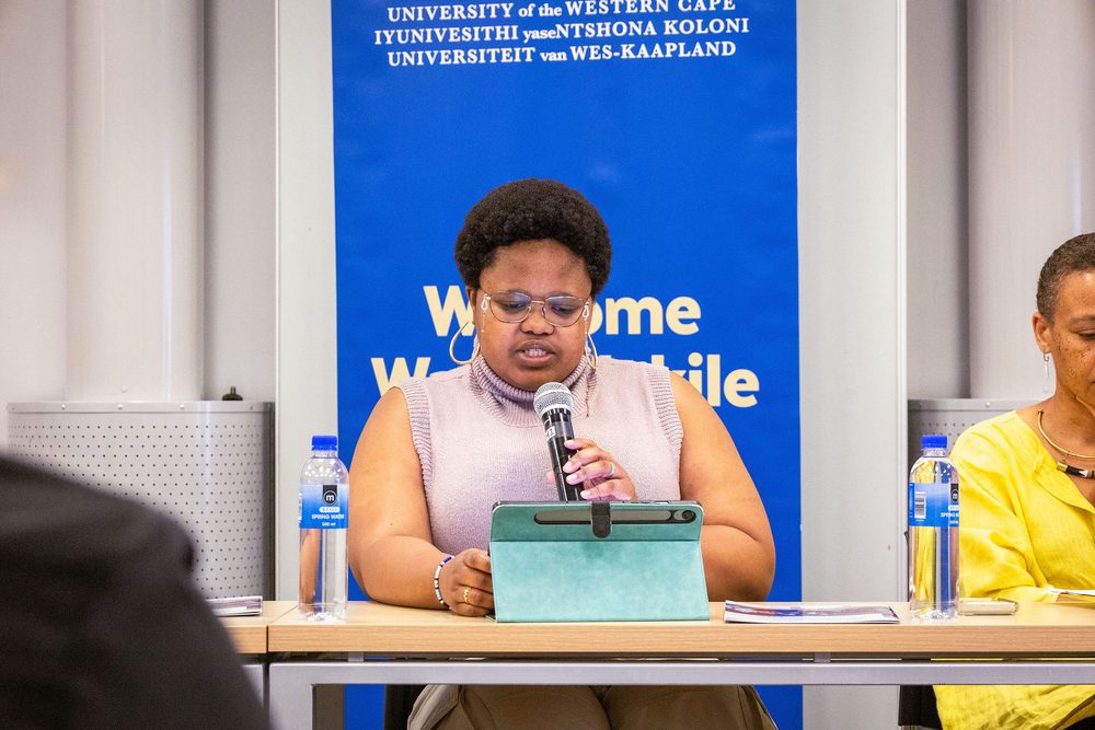A panellist presenting the student perspective on a decade of transformation